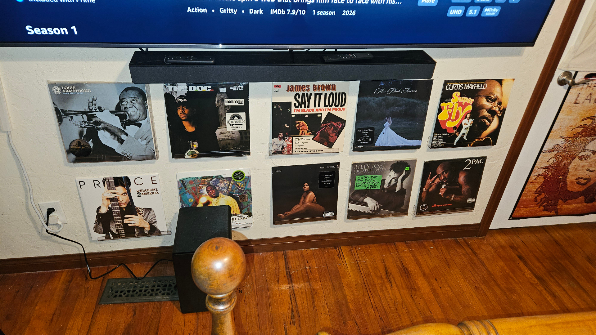 Album wall featuring jazz, hip hop, and soul records.